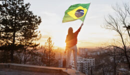 woman-holding-brazilian-flag-full-shot