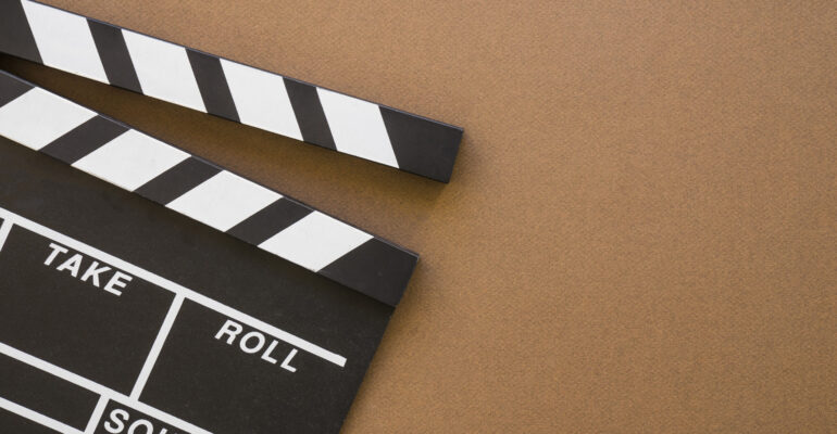 clapperboard-brown-background