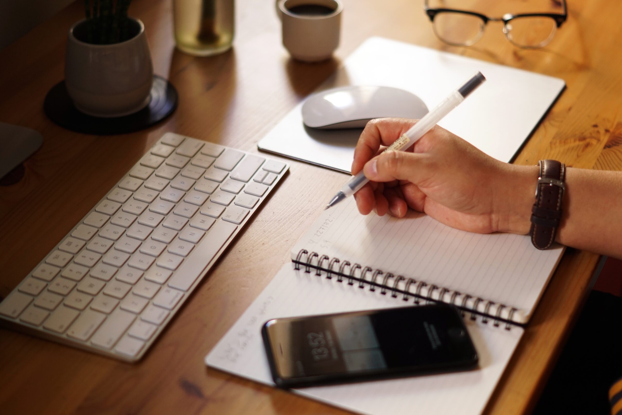 Closeup shot of an entrepreneur working from home and doing calculations