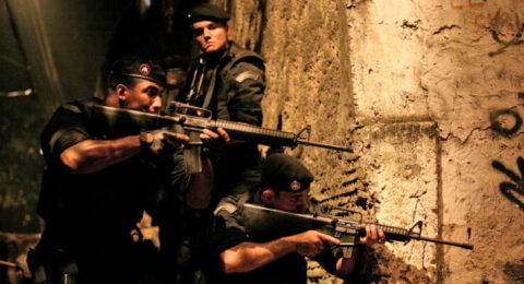 Armed BOPE officers in a tense urban operation, depicting the intense action and corruption themes of Elite Squad.